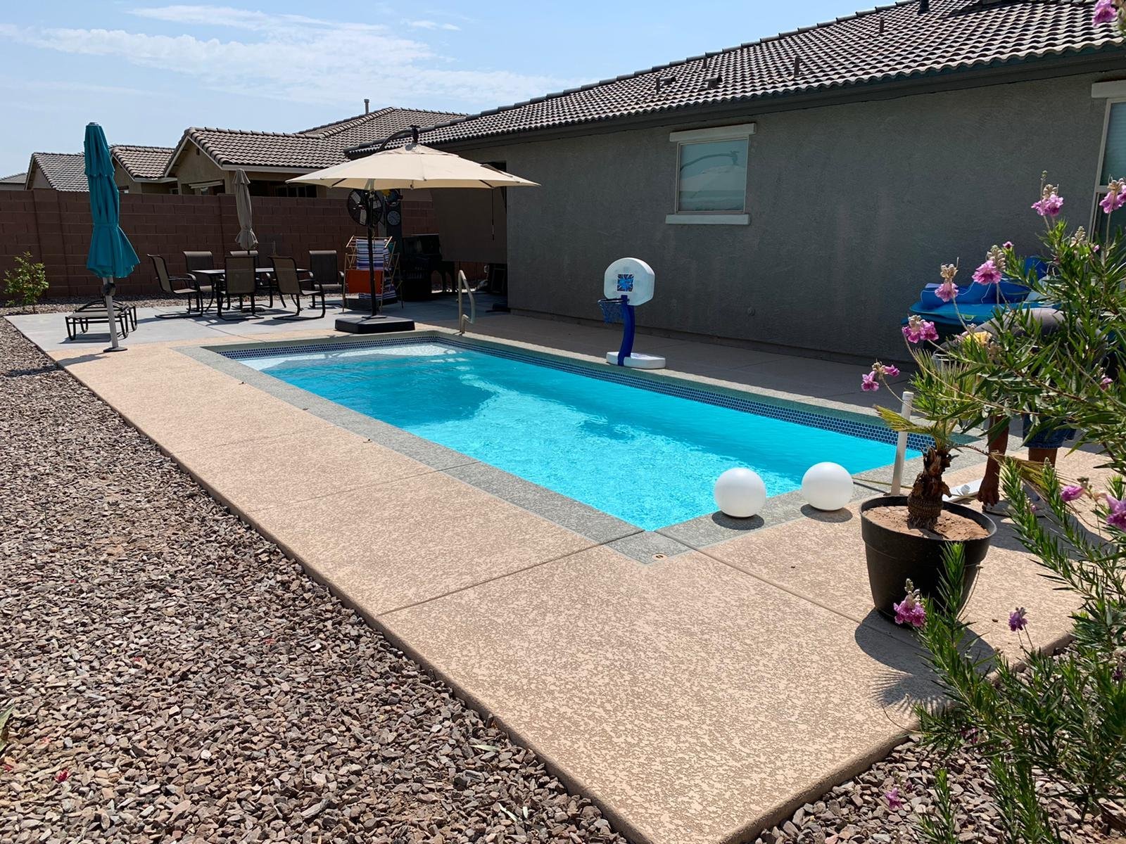 White fiberglass pool