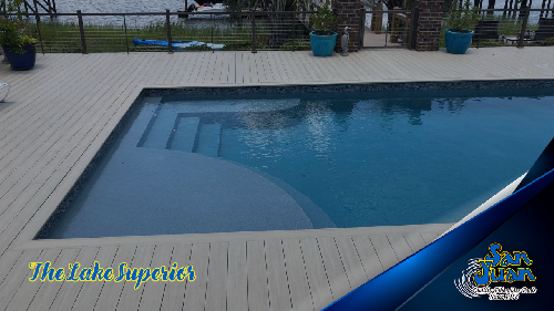 Lake Superior pool from San Juan with a light colored patio around a rectangle pool with blue water