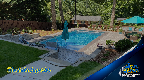 Lake Superior pool from San Juan Pools on a sunny day with an umbrella on the patio